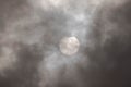 Solar eclipse on a cloudy day. Royalty Free Stock Photo