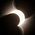 The sun\'s corona is visible, radiating outward in soft, wispy lines Royalty Free Stock Photo