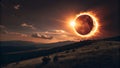 A solar eclipse occurs over a vast landscape with rolling hills and dense scrub Royalty Free Stock Photo