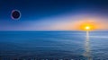 A solar eclipse over the ocean during a vibrant sunrise. The black disc of the moon obscures the sun, casting a ring of light Royalty Free Stock Photo