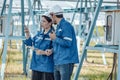 Solar electric installer and practitioner inspect electrical systems for appropriate wiring, polarity, grounding, and termination Royalty Free Stock Photo