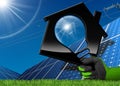 Solar Energy - House with a Light Bulb Royalty Free Stock Photo