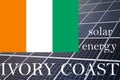 Solar energy panels with Ivory Coast flag background. Sustainable resources and renewable ivorian energy concept