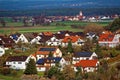 Solar energy panels on roofs of houses of country village 