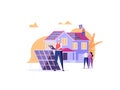 Solar engineer in uniform installs and tunes solar panels on house. Concept of solar energy, solar power, solar engineering