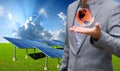 Solar farm with businessman carry virtual world
