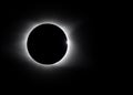 Solar flare and diamond ring around eclipse Royalty Free Stock Photo