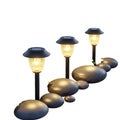Solar Garden Lights and Smooth Stones Royalty Free Stock Photo