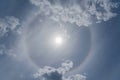 Solar, halo or sun dog, or parhelion interesting atmospheric optical phenomenon in the blue sky Royalty Free Stock Photo