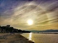 Solar halo with wispy clouds