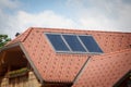 Solar installation on the roof of an Alpin chalet of slovenia with photovolatic modules, also called Solar panels Royalty Free Stock Photo