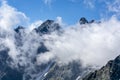 Solar observatory Lomnicky stit Lomnica Peak, Lomnica - A building emerging above the cloud on a beautiful sunny summer day. Royalty Free Stock Photo