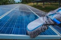 Solar panel, alternative electricity source - concept of sustainable resources, This`s the sun tracking systems, Cleaning will Royalty Free Stock Photo