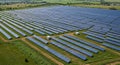 Solar Panel Array on Green Field, Renewable Energy Farm, Aerial View Royalty Free Stock Photo