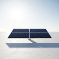 A solar panel array stands in a vast, barren landscape under a clear blue sky Royalty Free Stock Photo