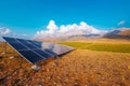 Solar panel on the background of mountains. green energy for life concept. sustainable development of new energy in agriculture Royalty Free Stock Photo