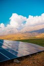 Solar panel on the background of mountains. sustainable development of new energy in agriculture Royalty Free Stock Photo