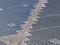 Solar panel banks installed in deserts to maximize the use of solar energy Royalty Free Stock Photo