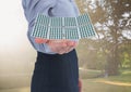 solar panel on businesswoman hand in the park