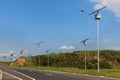 Solar panel on electric pole on highway, use of Solar energy fo Royalty Free Stock Photo