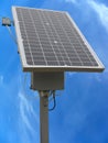 Solar panel with the equipment rack and cables over blue sky Royalty Free Stock Photo