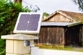 Solar panel gate house opening photovoltaic electric system for open door home garden Royalty Free Stock Photo