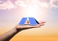 solar panel on hand sky back Royalty Free Stock Photo