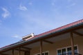 Solar panel for hot water system on roof blue sky background. Royalty Free Stock Photo