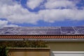 Solar panel on house roof damaged and broken by hail storm after spring summer thunderstorm violent