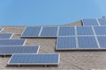 Solar panel installation on asphalt shingles rooftop Royalty Free Stock Photo