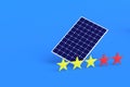 Solar panel near three yellow and two red stars of rating on velvet violet background Royalty Free Stock Photo