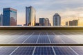 Solar Panel Photovoltaic installation on a Roof of factory, sunny blue sky background, alternative electricity source - Royalty Free Stock Photo