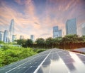 Solar Panel Photovoltaic installation with urban landscape landmarks, alternative electricity source