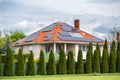 Solar panel on a red roof