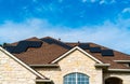Solar Panel rooftops on nice brick home