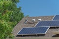 Solar panel system with attic junction box and trees