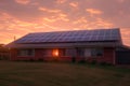 Solar panel system on individual house roof, sunset sky background