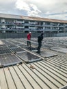 Solar panel technician and engineer working on installing solar panel. Renewable energy