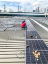 Solar panel technician and engineer working on installing solar panel. Renewable energy