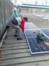 Solar panel technician and engineer working on installing solar panel. Renewable energy