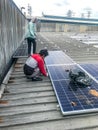 Solar panel technician and engineer working on installing solar panel. Renewable energy