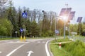 Solar Panel and Windmill Energy on Road with Traffic Light Royalty Free Stock Photo