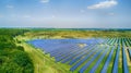 Solar panels in aerial view. Solar power plant in the field. Solar farm. The source of ecological renewable energy. Royalty Free Stock Photo