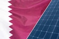 Solar panels against flag Qatar background