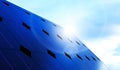 Solar panels on blue sky background. Photovoltaic cells of solar panel generating clean energy from the sun. 3d Royalty Free Stock Photo