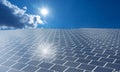 Solar Panels on blue sky with sun shining Royalty Free Stock Photo