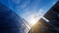 Solar Panels with a Bright Sun in the Sky Royalty Free Stock Photo