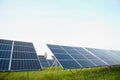 Solar panels energy farm on sky background. Royalty Free Stock Photo