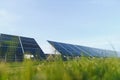 Solar panels energy farm on sky background. Royalty Free Stock Photo