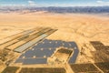 Solar panels farm energy panel Israel desert mountains from above aerial view